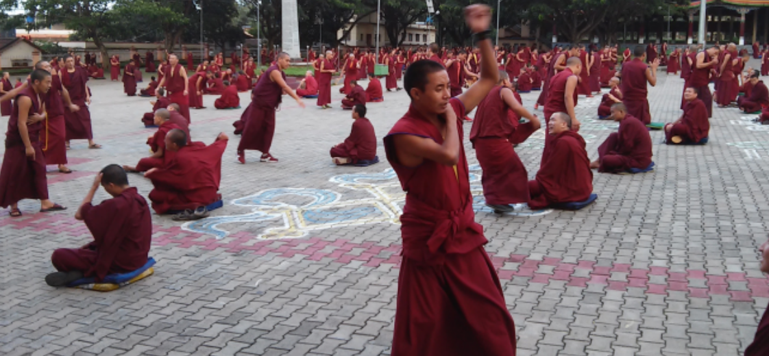Monastic debate as practice by Tibetan monks.